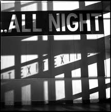 At the Staten Island ferry terminal in Manhattan part of a sign stood in the shadow of the exit of passengers arriving in Manhattan